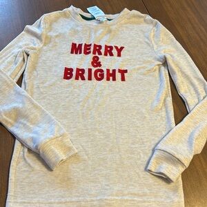Member’s Mark pajama top or long sleeve tee. Size is girls 10.